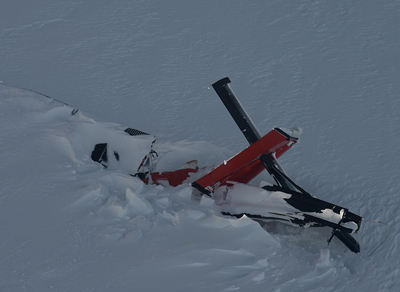 Only the tail and part of one wing was visible a few days after the crash.